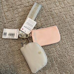 lululemon gold hardware pink and cream dual pouch wristlet